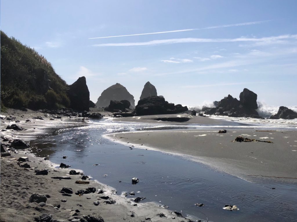 Afternoon glare on a rocky beach